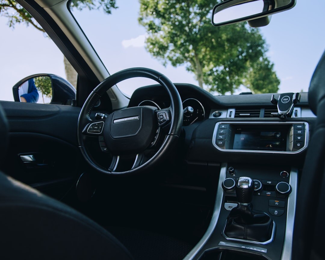 Luxury car interior dashboard and steering wheel