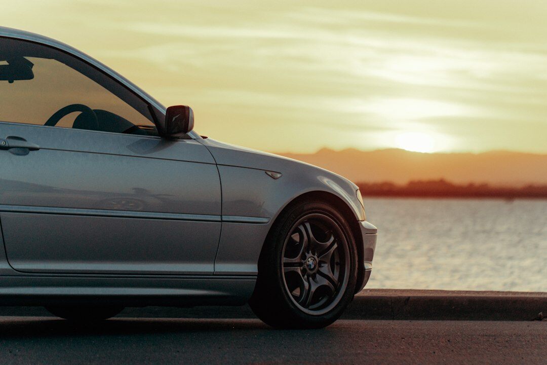 exclusive car parked at sunset