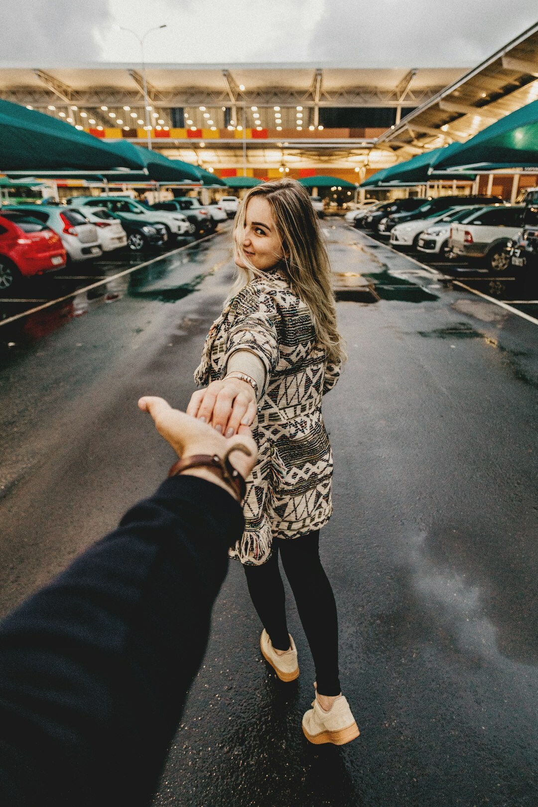 Handshake between two people over a car sale