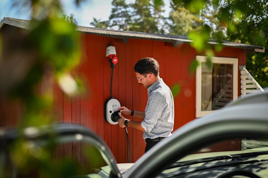 Electric car charging at a modern charging station